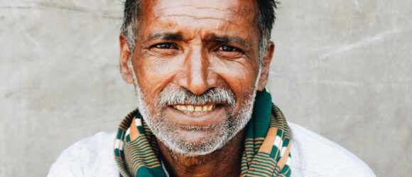 Person relaxing at home, reflective moment.